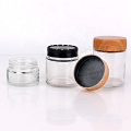 hot sell 1oz 3oz 4oz wide mouth clear glass child resistant jar with wooden transfered printed plastic screw lid